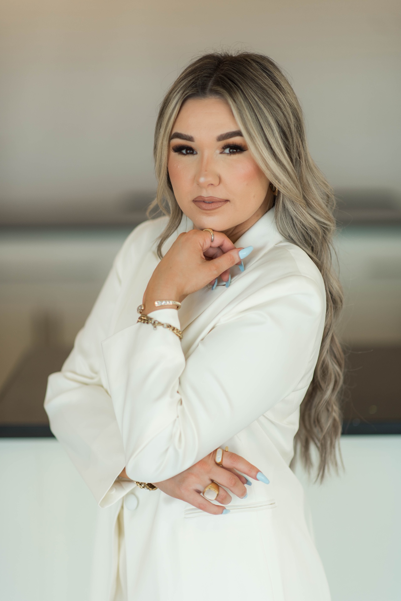 Portrait of Natalie Breckenridge in an ivory blazer